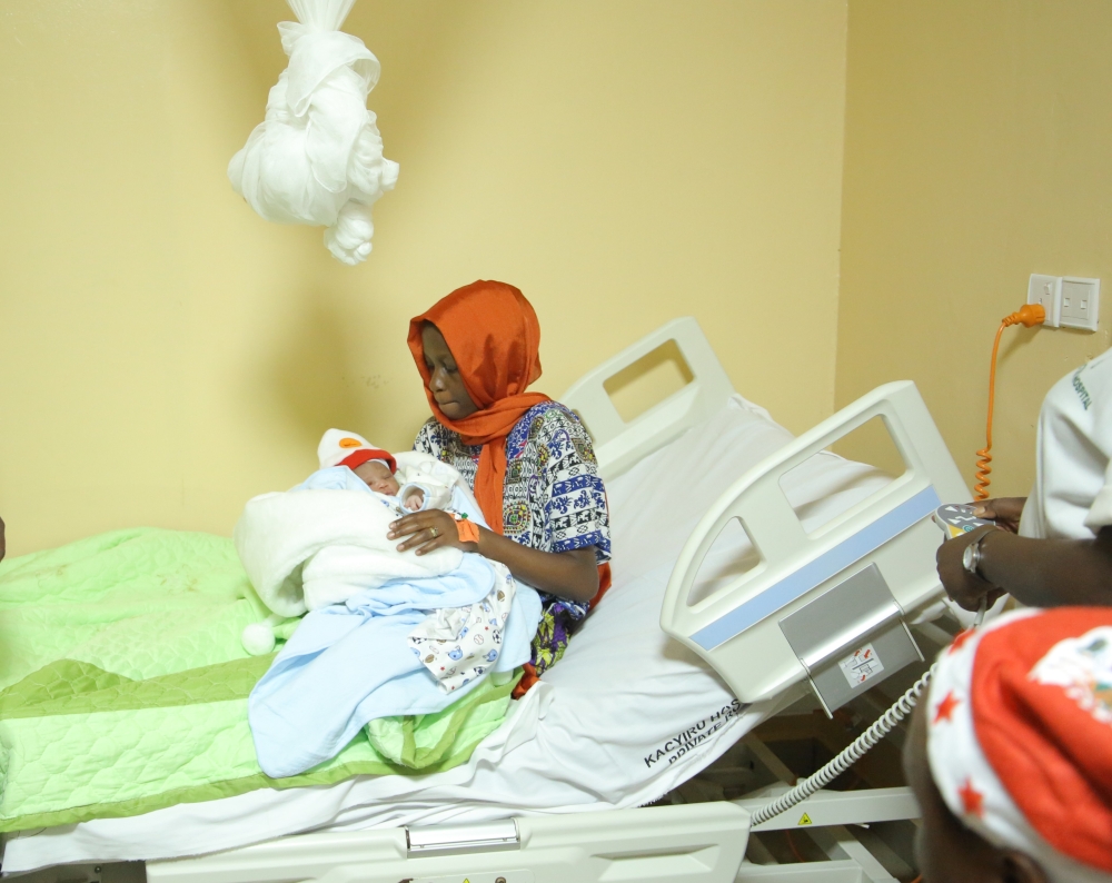 Mother looking at his born baby Mother looking at his born baby