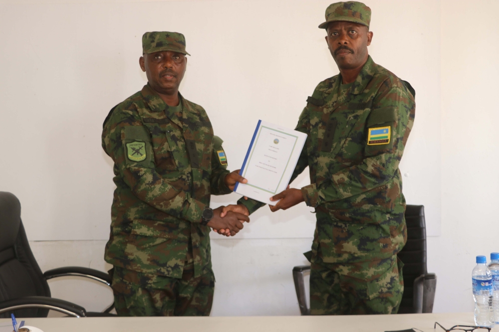 Outgoing Task Force Battle Group commander Brig. Gen. Frank Mutembe (left)  handed over to Col. Theodomile Bahizi on Friday, August 4, 2023, at a ceremony in Mocimboa da Praia, Cabo Delgado. Courtesy.