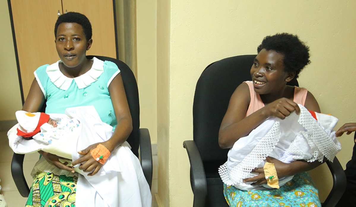 Two mothers carrying their new born babies at Kacyiru hospital on December 25, 2022. Photos by Craish Bahizi.