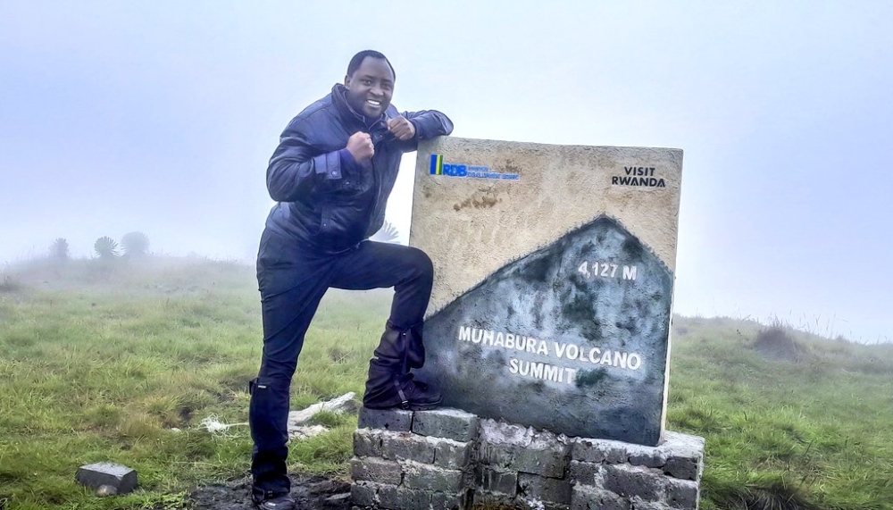 Standing at the summit of Muhabura volcano - a feeling of triumph and awe.