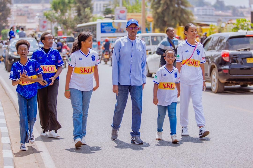 Rayon Sports President Jean-Fidèle Uwayezu (c) leads the fans parade ahead of Saturday’s Rayon Sports Day. Courtesy