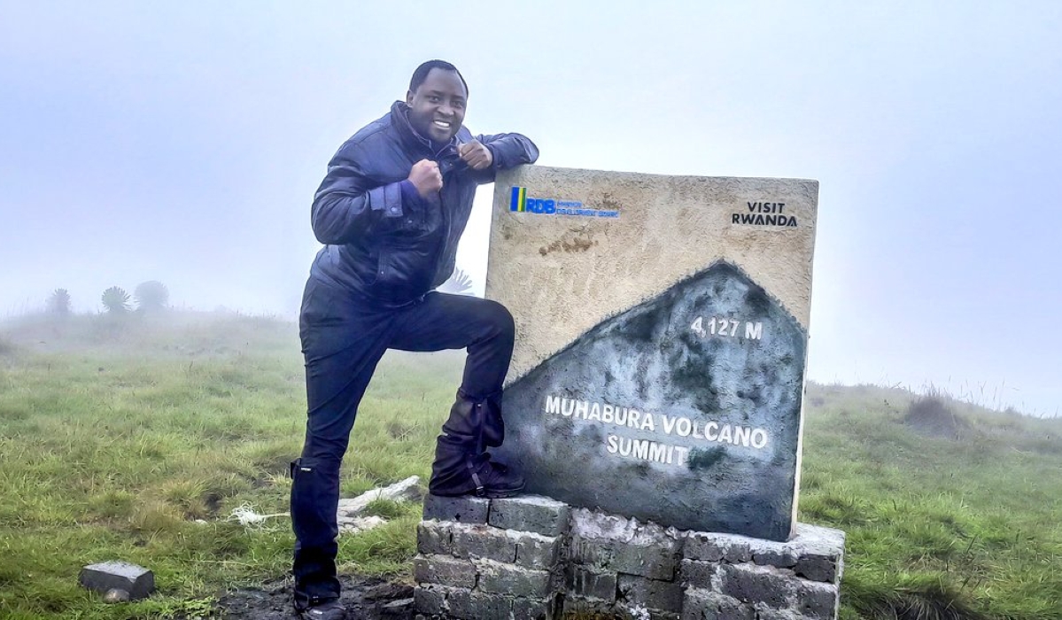 Standing at the summit of Muhabura volcano - a feeling of triumph and awe.