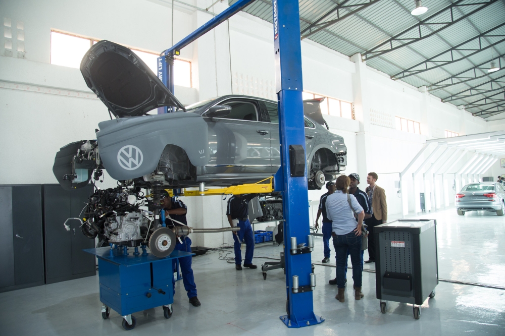 Technicians assemble  a volkswagen car at the firm in Kigali. Despite facing challenges in recent years, Rwanda has remained one of the top performers in Africa. Photo by Sam Ngendahimana