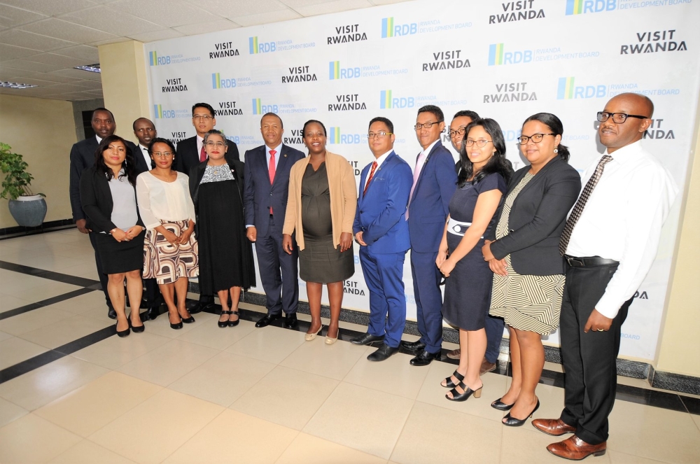 A delegation of Rwanda Development Board and the Economic Development Board of Madagascar (EDBM) pose for a photo after signing an MoU in Kigali in 2019. File