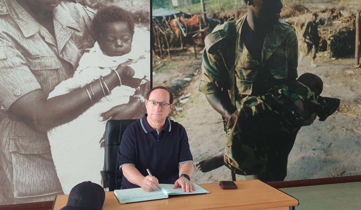 Ambassador Rom Adam signs the book of visitors during his tour of the Museum of the Campaign Against Genocide  on August 6, to pay tribute to the fighters who liberated Rwanda. Courtesy