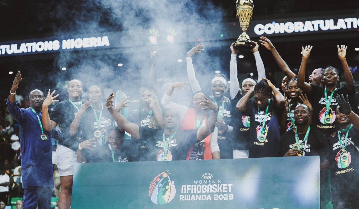 Nigeria women players celebrate the victory as they win the title in Kigali on Saturday, August 5. DAN GATSINZI