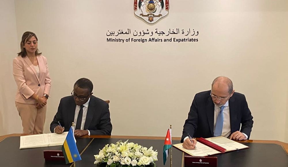 Rwanda’s Foreign Affairs Minister Vincent Biruta and the Deputy Prime Minister and Minister of Foreign Affairs and Expatriates of the Hashemite Kingdom of Jordan, Ayman Safadi, sign three agreements including a visa waiver for holders of ordinary passports, in Amman, on Wednesday, August 9, 2023. Courtesy.