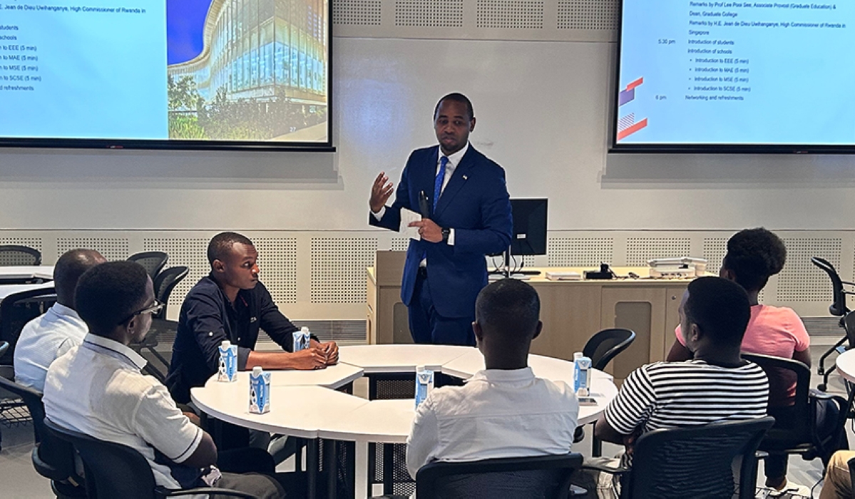 Ambassador Jean de Dieu Uwihanganye, speaks to the 10 rwandans during a welcome and orientation ceremony was held for them On Tuesday, August 8.