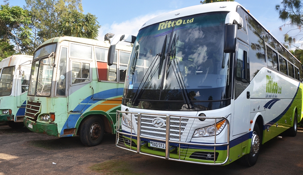 Some of  the old buses of ONATRACOM and the brand new bus of RITCO during the handover ceremony  after the privatization of  the former public institution on February 6, 2017.  Photo by Sam Ngendahimana