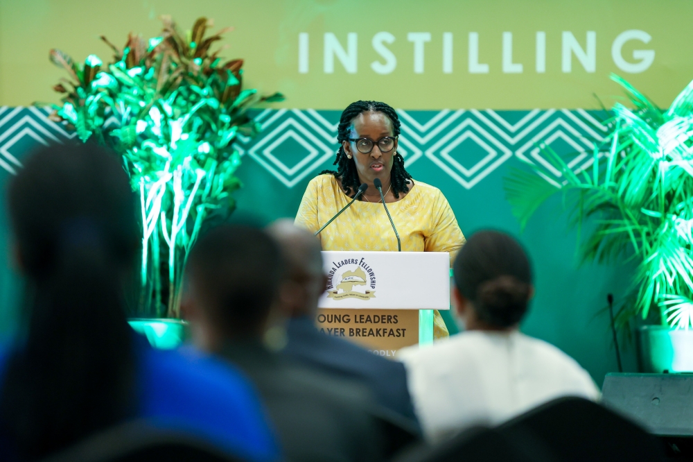 First Lady Jeannette Kagame  addresses delegates during Young Leaders Prayer Breakfast, on August 13.  PHOTOS BY OLIVIER MUGWIZA