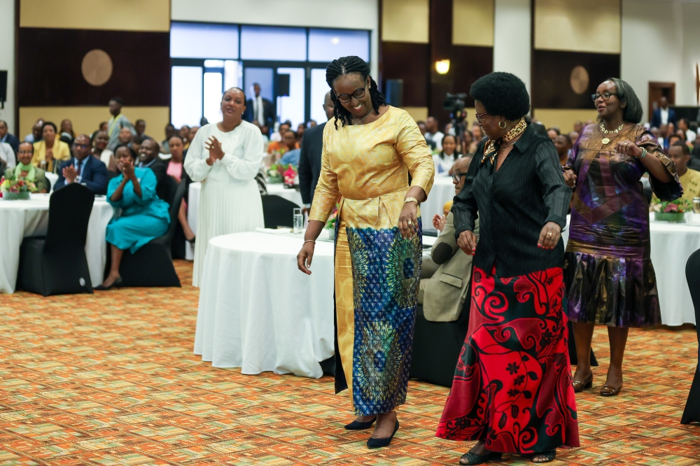  First Lady urges men to share parenting equally with women