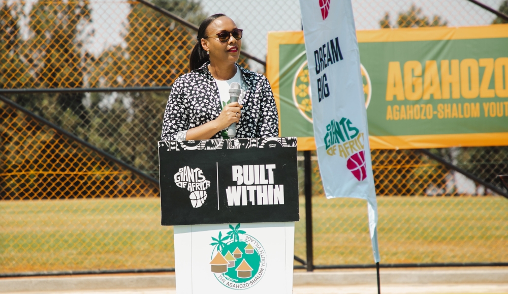 Sports Minister Aurore Munyangaju delivers remarks at the inauguration of the two basketball courts at Agahozo Shalom. Sports Minister Aurore Munyangaju delivers remarks at the inauguration of the two basketball courts at Agahozo Shalom.