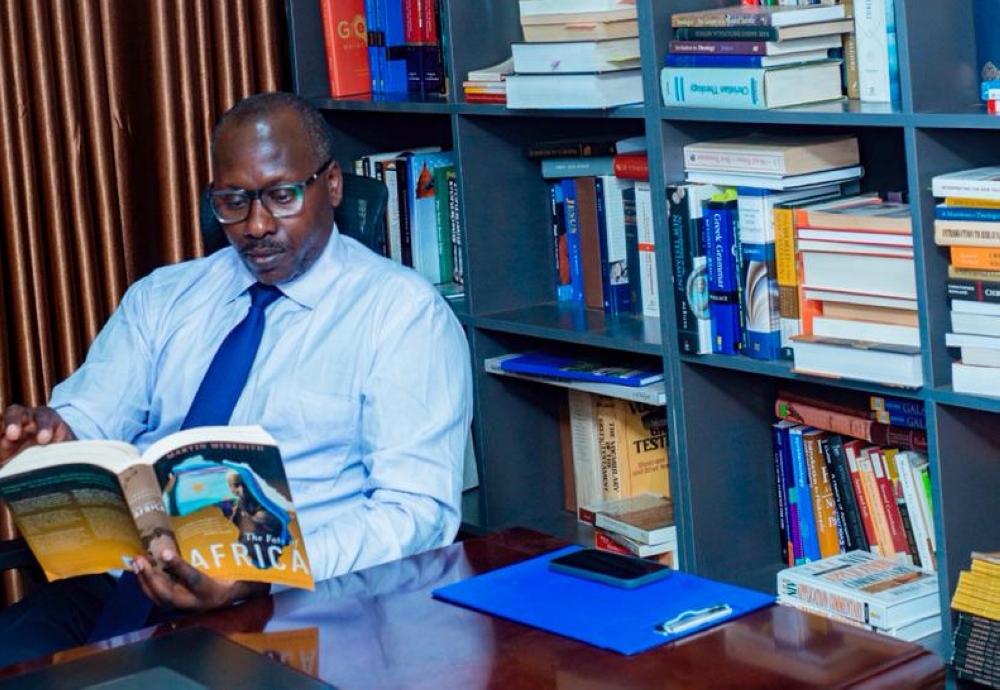 Fred Kiiza, a fervent reader who has read over 2,000 books in the past 15 years
