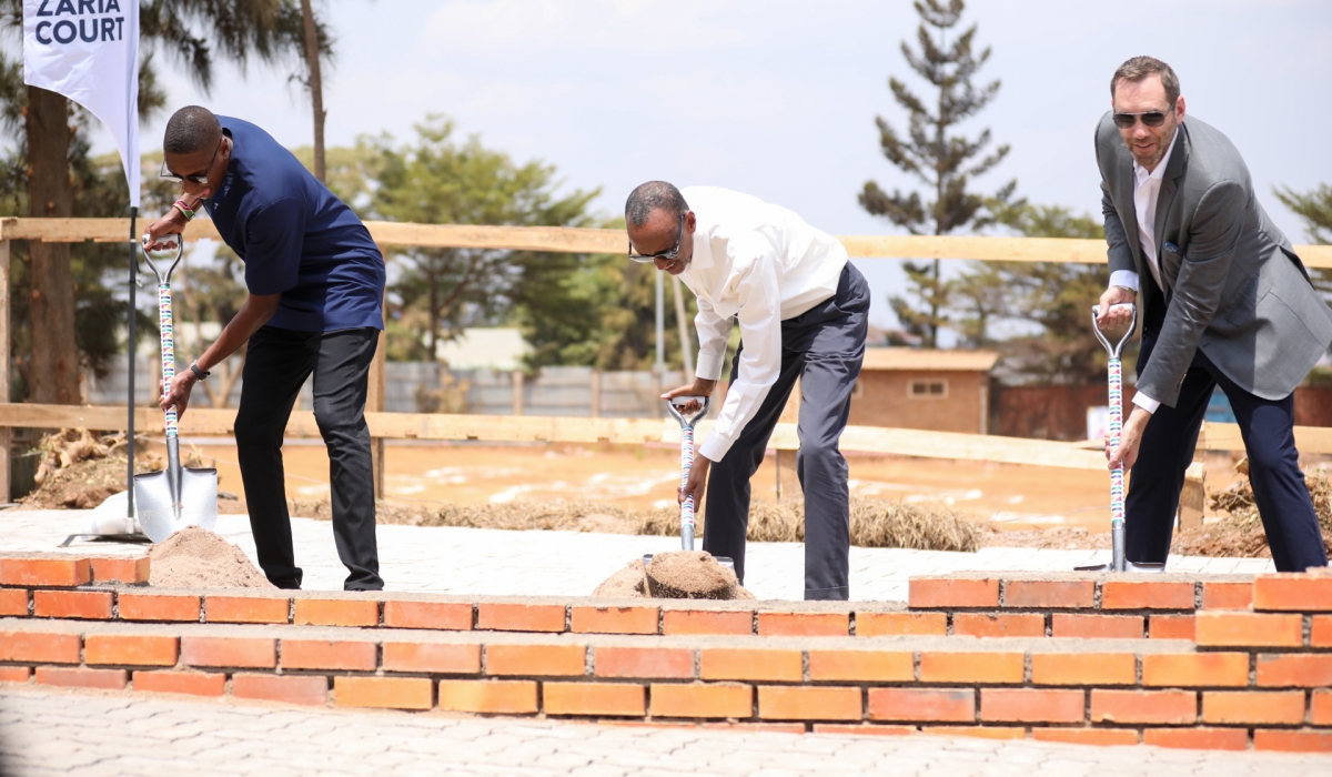 President Paul Kagame,  Masai Ujiri, Toronto Raptors president and vice-chair and Giants of Africa co-founder (L) and Andrew Feinstein, the project’s co-sponsor (Right) during  the official groundbreaking ceremony of the “Zaria Court Kigali” in Remera, on Monday, August 14. All photos by Dan Gatsinzi
