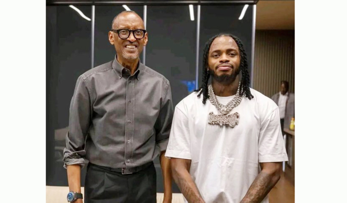 President Paul Kagame poses for a photo with Diamond Platnumz after his performance during the opening of Giants of Africa Festival in Kigali on August 13. Courtesy