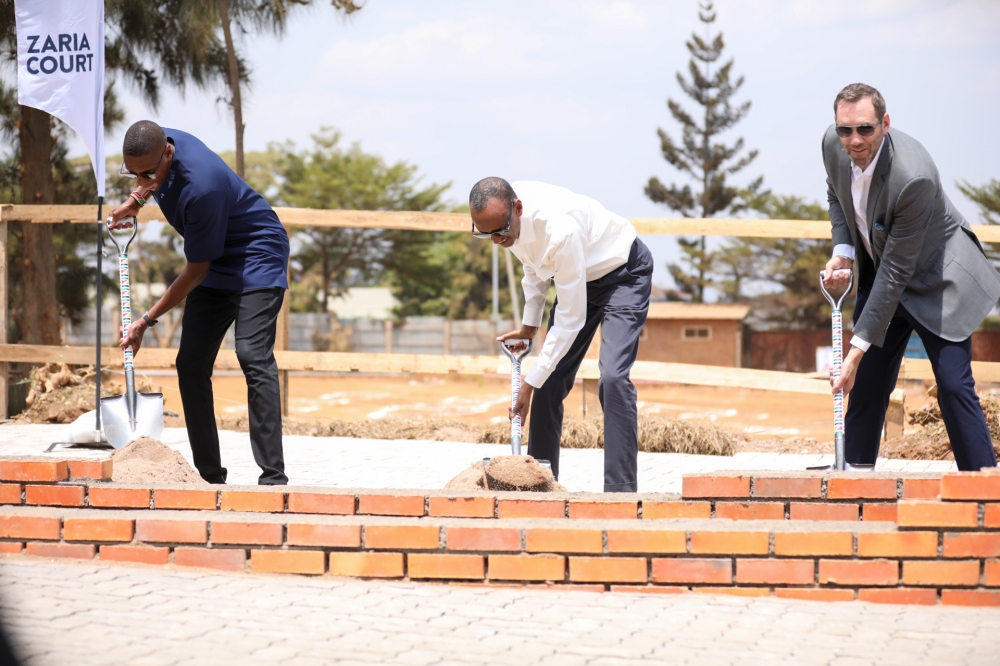  President Paul Kagame, Masai Ujiri, Toronto Raptors president and vice-chair and Giants of Africa co-founder (L) and Andrew Feinstein, the project’s co-sponsor (Right) during the official groundbreaking ceremony of the “Zaria Court Kigali" on Monday, August 14.