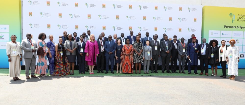 Delegates pose for a group photo at  the official opening of the Golden Business Forum in Kigali.