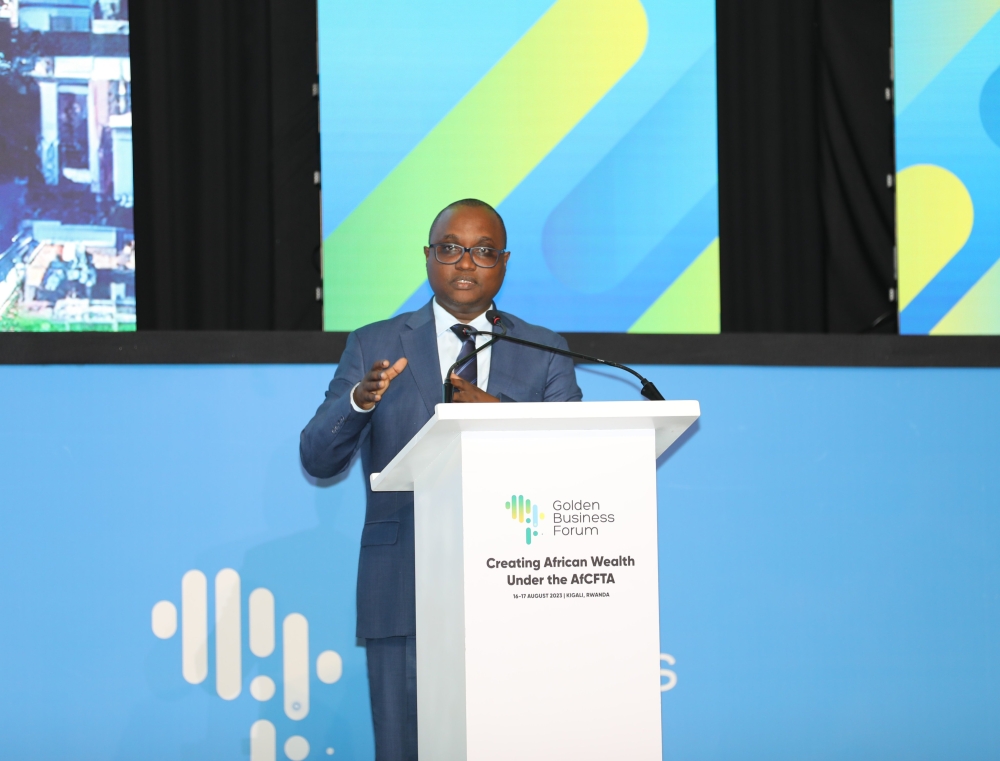 Minister of Trade and Industry, Jean-Chrysostome Ngabitsinze, delivers remarks during the official opening of the Golden Business Forum in Kigali on Wednedsay, August 16. Courtesy