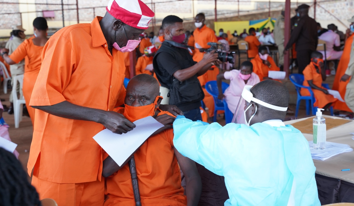 Prisoners undergo a vaccination exercise at Nyarugenge Prison. RIB has arrested  a medic at Nyarugenge prison for offences including  alleged sale of medicine meant to treat inmates. CRAISH BAHIZI