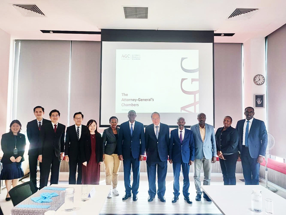 Chief Justice, Faustin Ntezilyayo and his delegation with the host, pose for a photo during a three-day working visit to Singapore , on Wednesday, August 16. Courtesy