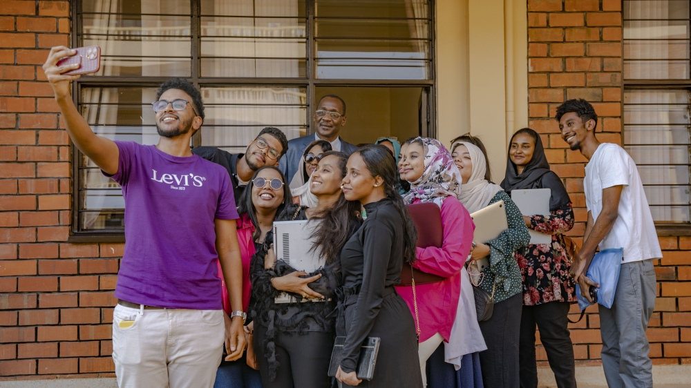 Some of dentistry students from Sudan taking a picture with Abdalla Aljabry, the Vice Dean of the Faculty of Dentistry at the University of Medical Science and Technology of Sudan. All photos by Emmanuel Dushimimana
