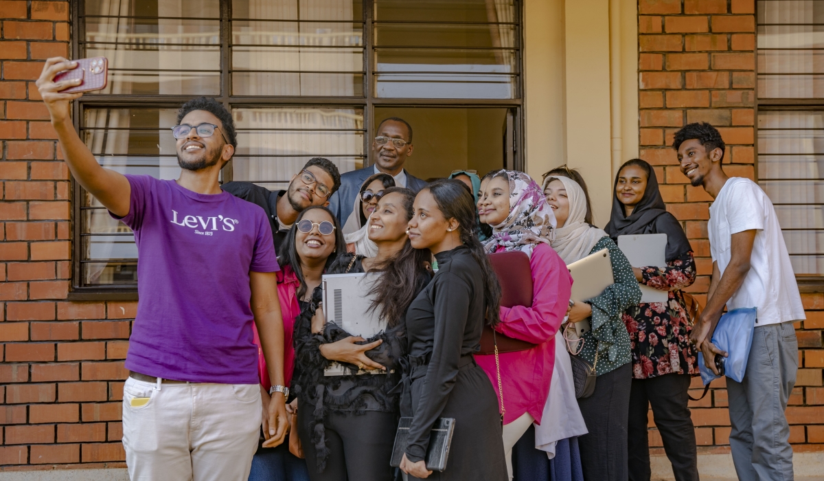Some of dentistry students from Sudan taking a picture with Abdalla Aljabry, the Vice Dean of the Faculty of Dentistry at the University of Medical Science and Technology of Sudan. All photos by Emmanuel Dushimimana