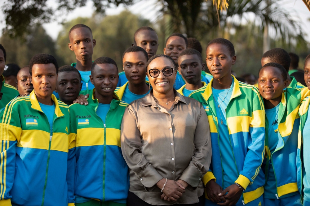 The Minister of Education Dr. Valentine Uwamariya in photo with players. She has urged the Rwandan teams representing the country at the 2023 FEASSSA  Games to show discipline.Courtesy