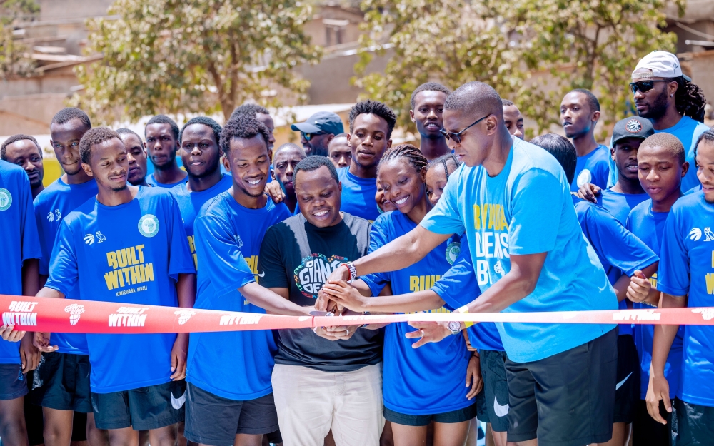 Abdallah Utumatwishima, Minister of Youth and Masai Ujiri, Co-founder of Giants of Africa and Vice Chairman and President of Toronto Raptors, unveiling the "Kimisagara Dreams Big Court," on Saturday, August 19. Courtesy photos