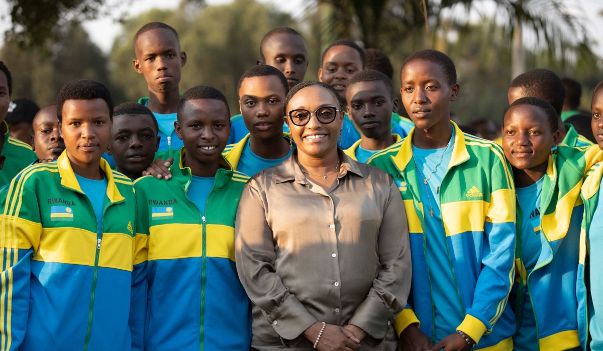 The Minister of Education Dr. Valentine Uwamariya in photo with players. She has urged the Rwandan teams representing the country at the 2023 FEASSSA  Games to show discipline.Courtesy