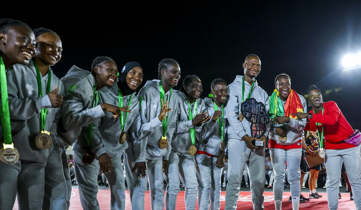 Winners celebrate with the trophy after winning All Stars Games on Friday. All photos by Olivier Mugwiza