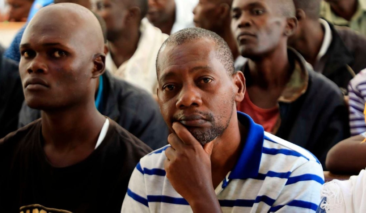 Pastor Paul Mackenzie (C) follows proceedings at the Shanzu Law Courts in Kilifi County, Kenya during the mention of his matter on July 3, 2023. Photo by Kevin Odit _ NMG