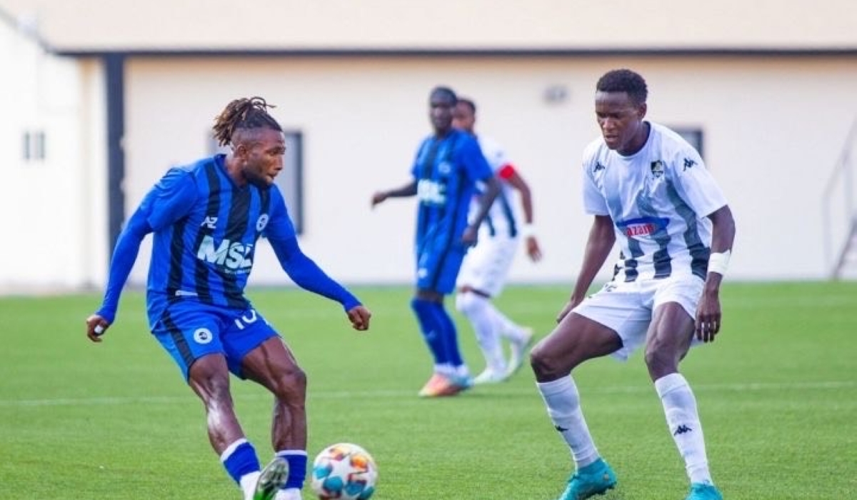 APR&#039;s Omborenga Fitina tries to block an effort from Gaadiidka star Pentecost Obiechina-Photo by APR FC. Courtesy photo