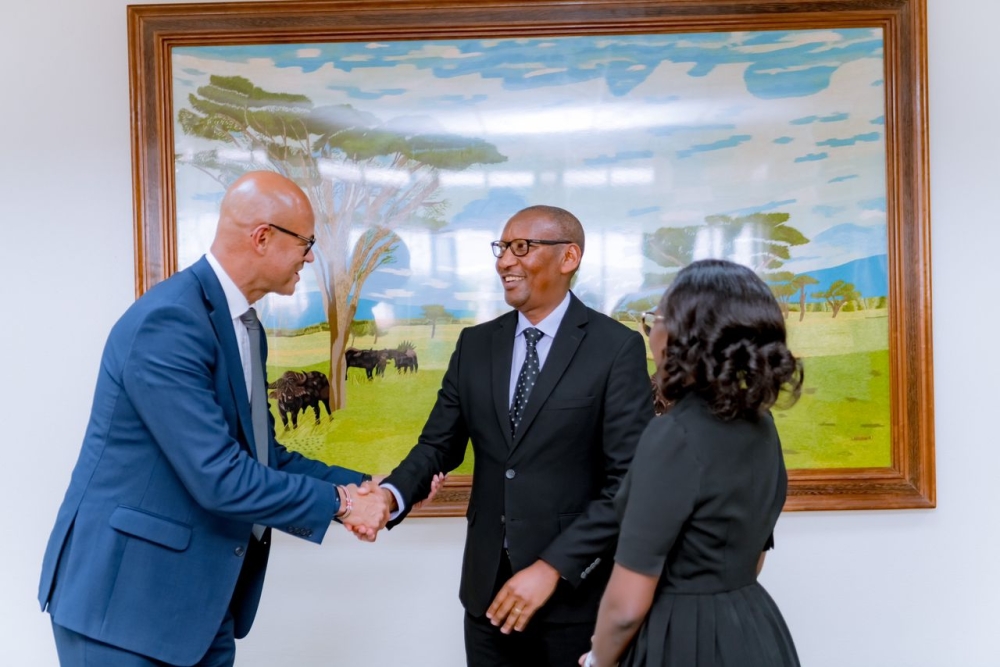 Jeremy Awori, the CEO of Ecobank Transnational Group meets with Central Bank Governor John Rwangombwa during his visit to Rwanda on August 18. Courtesy