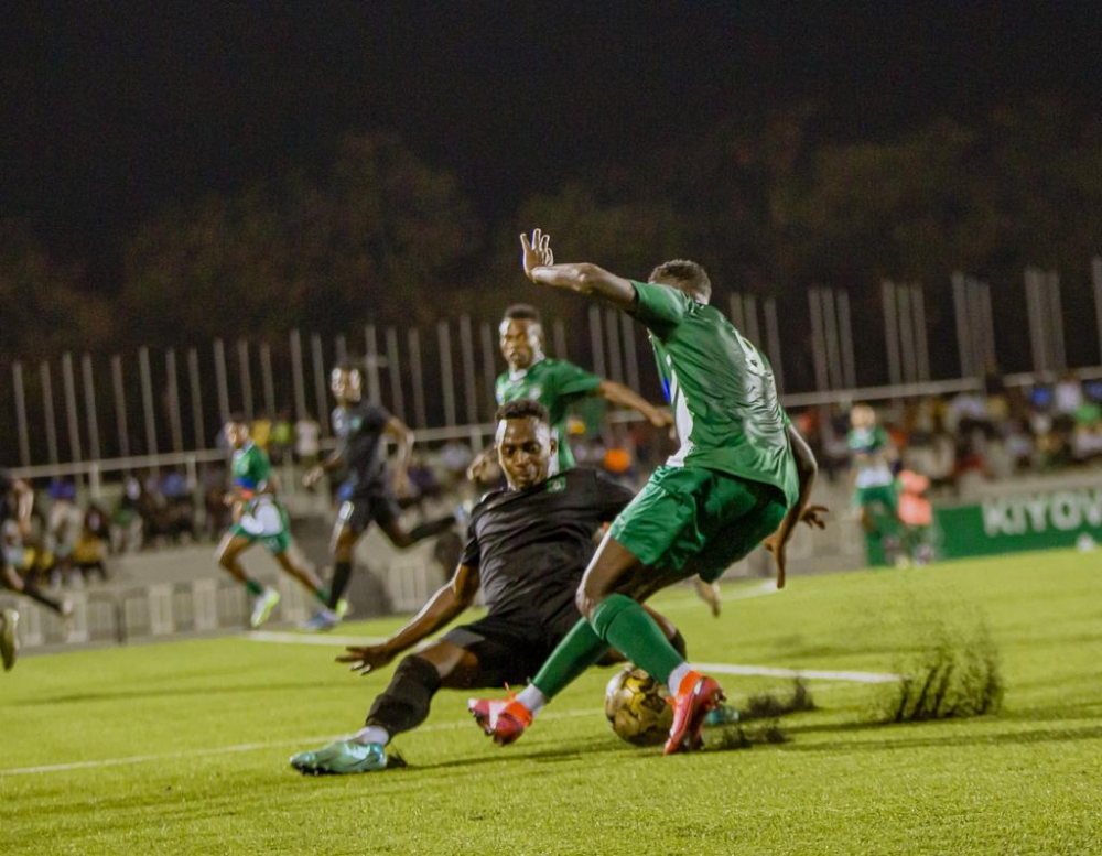 Kiyovu Sports player with the ball tries to go past Muhazi United&#039;s defender during a goalless draw at Kigali Pele Stadium on Sunday August 20. Courtesy