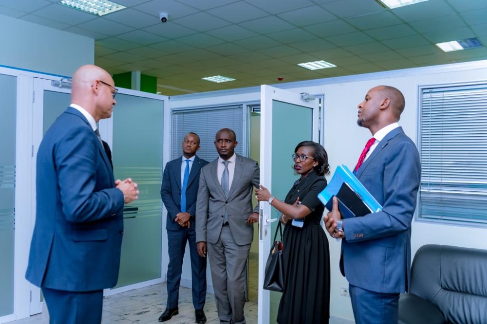 Jeremy Awori, the CEO of Ecobank Transnational Group,interacts with employees during his visit to Ecobank Rwanda Plc Jeremy Awori, the CEO of Ecobank Transnational Group,interacts with employees during his visit to Ecobank Rwanda Plc