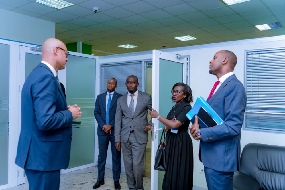 Jeremy Awori, the CEO of Ecobank Transnational Group,interacts with employees during his visit to Ecobank Rwanda Plc
