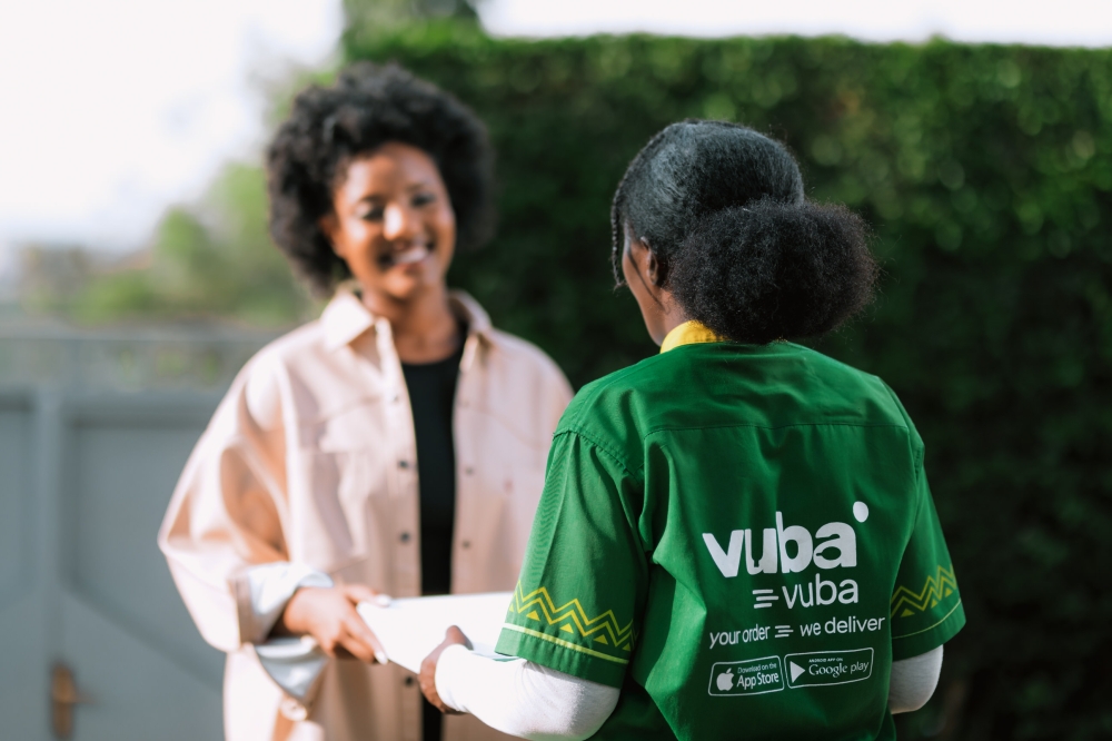A female rider delivers the items to a client. VubaVuba Africa Ltd was founded in January 2020 by Innocent Kaneza and Albert Munyabugingo, CEO and co-founder of VubaVuba Africa Ltd.
