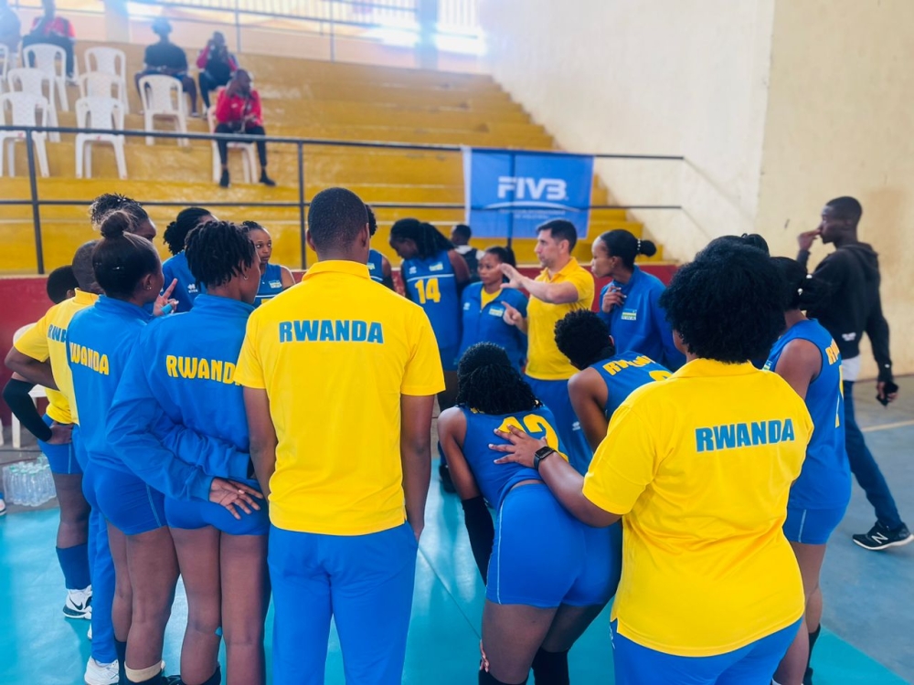 Rwanda volleyball teams head coach Paulo De Tarso gives instructions to the team during the game against Morocco on Sunday. Courtesy