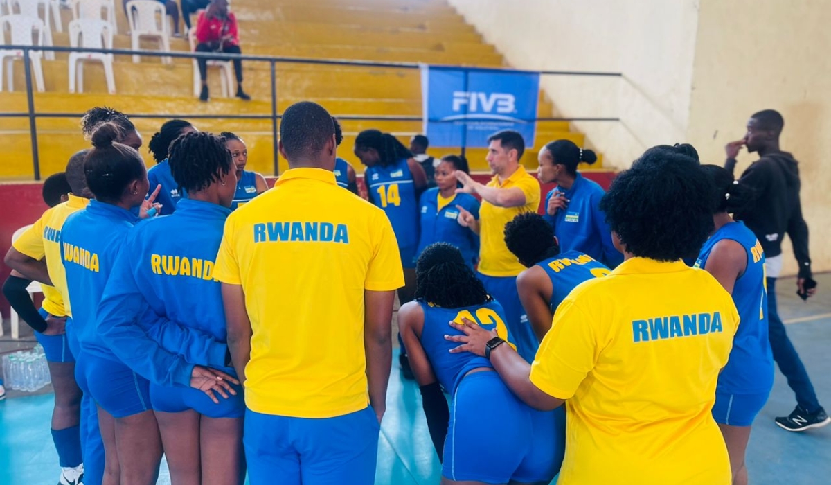 Rwanda volleyball teams head coach Paulo De Tarso gives instructions to the team during the game against Morocco on Sunday. Courtesy