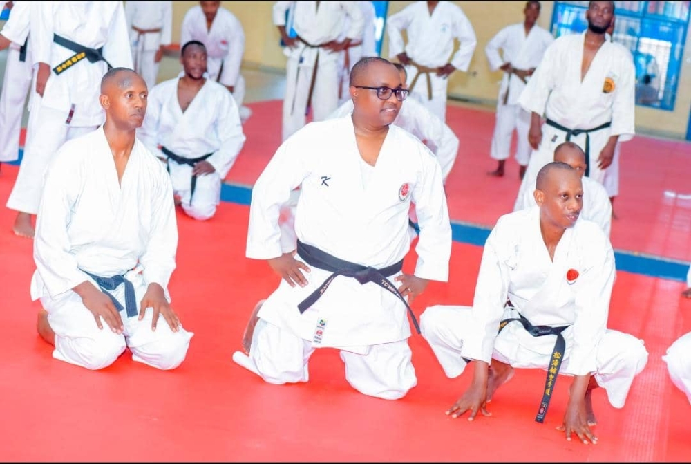 Jean Chrysostome Ngabitsinze(C), the Minister of Trade and Industry, was awarded the second Dan during a Shotokan Karate seminar that concluded in Kigali on Sunday, August 20-courtesy