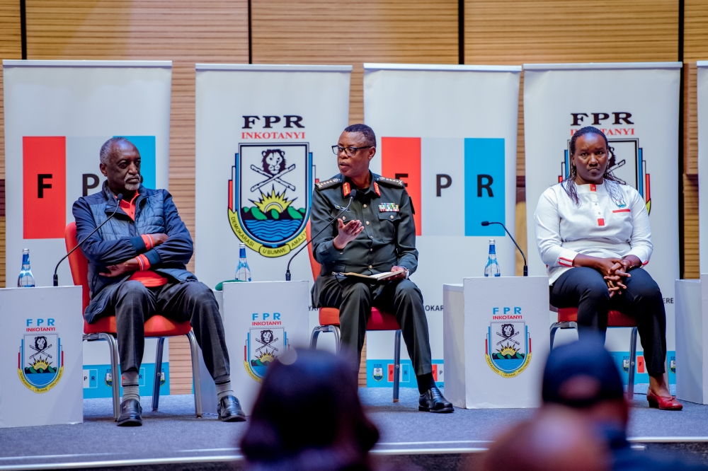 Senior Presidential Advisor Gen James Kabarebe speaking on a penal during an RPF meeting on national unity last month. Curtsey 