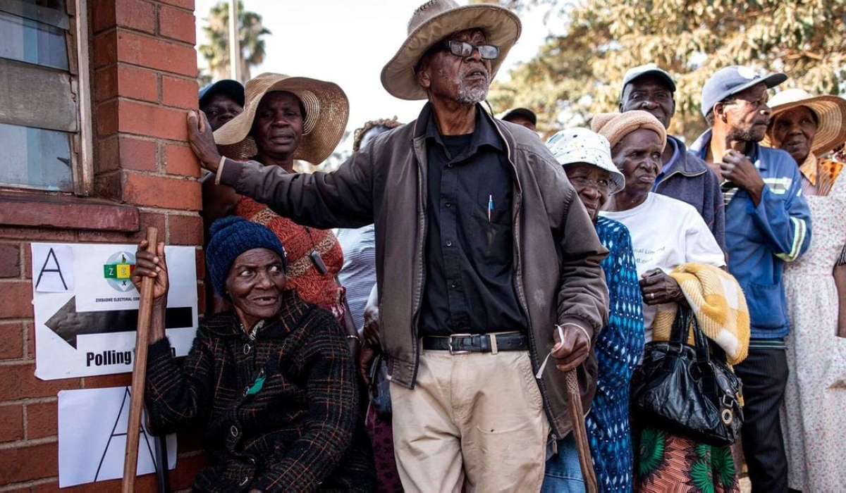Voters queue outside a polling station during presidential and legislative elections in Harare, Zimbabwe on August 23, 2023. PHOTO _ JOHN WESSELS _ AFP