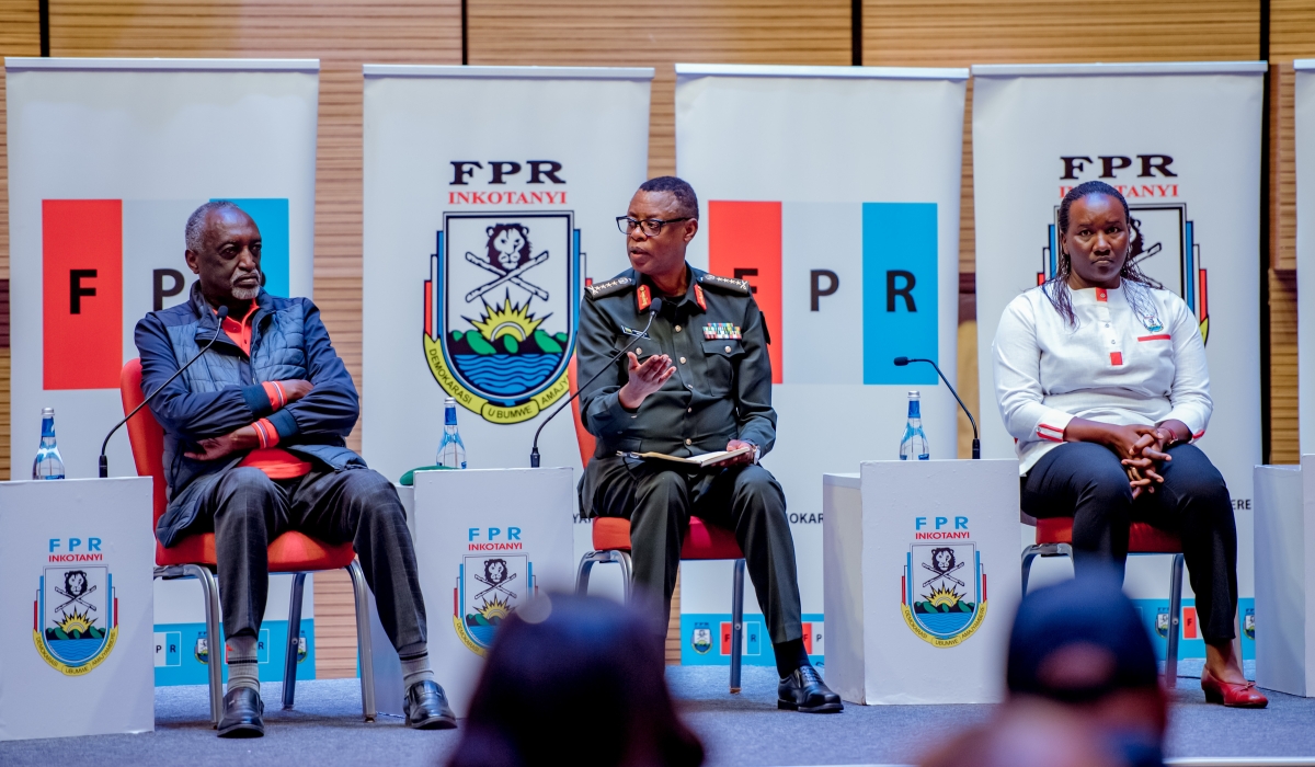 Senior Presidential Advisor Gen James Kabarebe speaking on a penal during an RPF meeting on national unity last month. Curtsey 