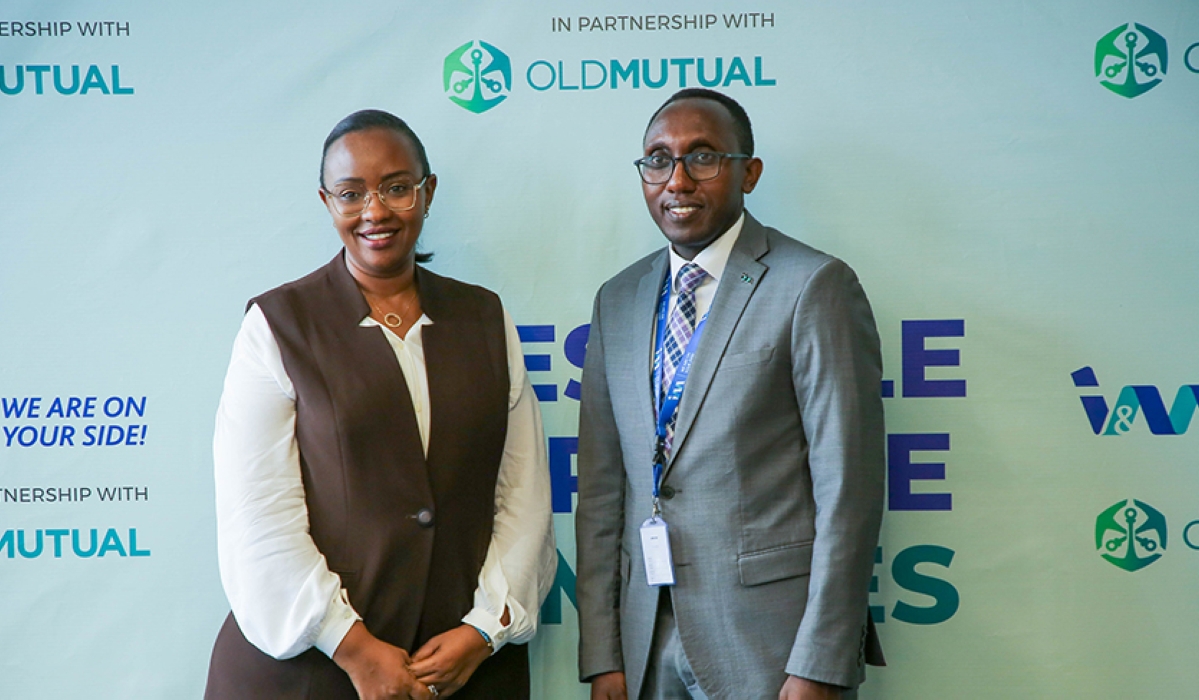 I&M Bank CEO Benjamin Mutimura and Annie Nibishaka, CEO of Old Mutual pose for a photo during the launch of the new parternship in Kigali on Thursday, August 24. All photos by Craish Bahizi