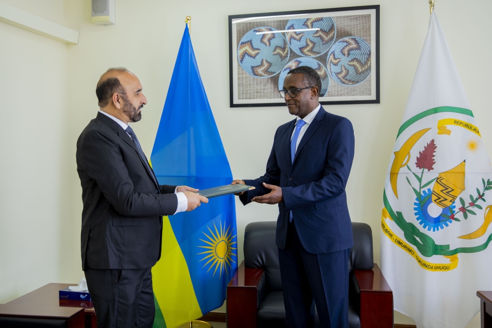 Naeem Ullah Khan, the Pakistan High Commissioner-designate to Rwanda, presents copies of his letters of credence to the Minister of Foreign Affairs Dr Vincent Biruta on August 16. Courtesy