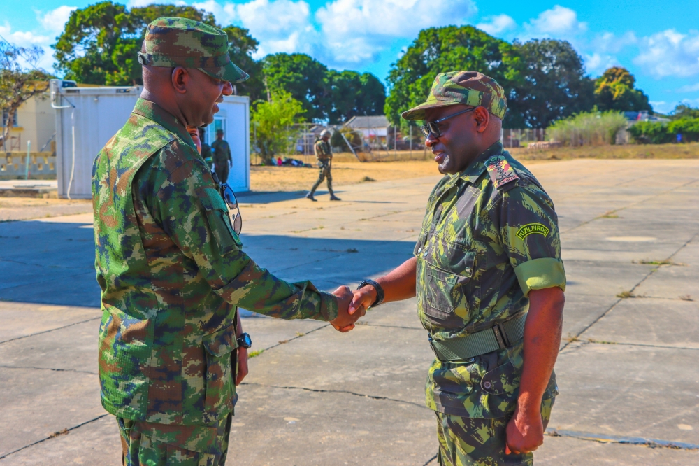Maj Gen Alexis Kagame, the joint task force commander of the Rwandan Security Forces welcomes the Chief of General Staff of the Mozambican Armed Defence Forces (FADM), Admiral Joaquim Mangrasse on Friday, August 25.