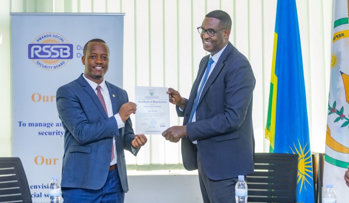 Regis Rugemashuro, CEO of RSSB receiving the certificate from David Kanamugire  CEO of Rwanda&#039;s National Cyber Security Authority (NCSA)