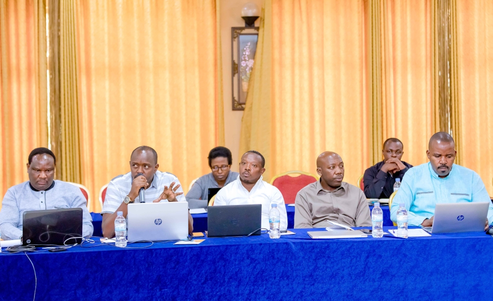 Delegates follow a presentation during the meeting on Wednesday, August 30