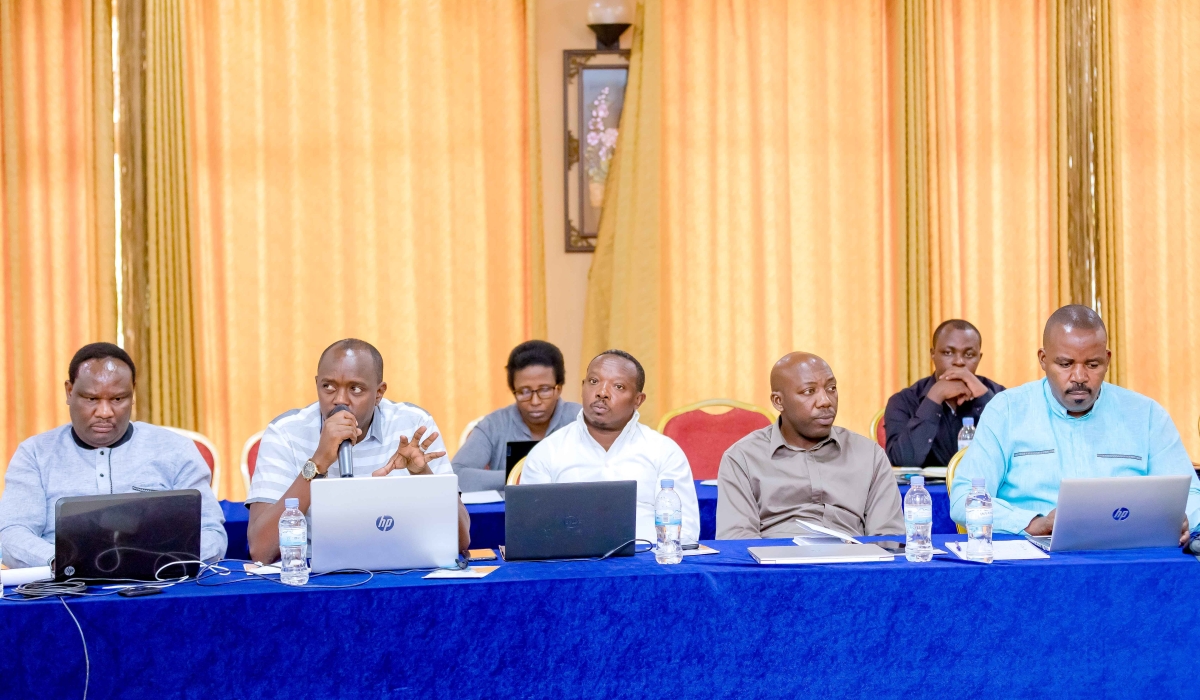 Delegates follow a presentation during the meeting on Wednesday, August 30