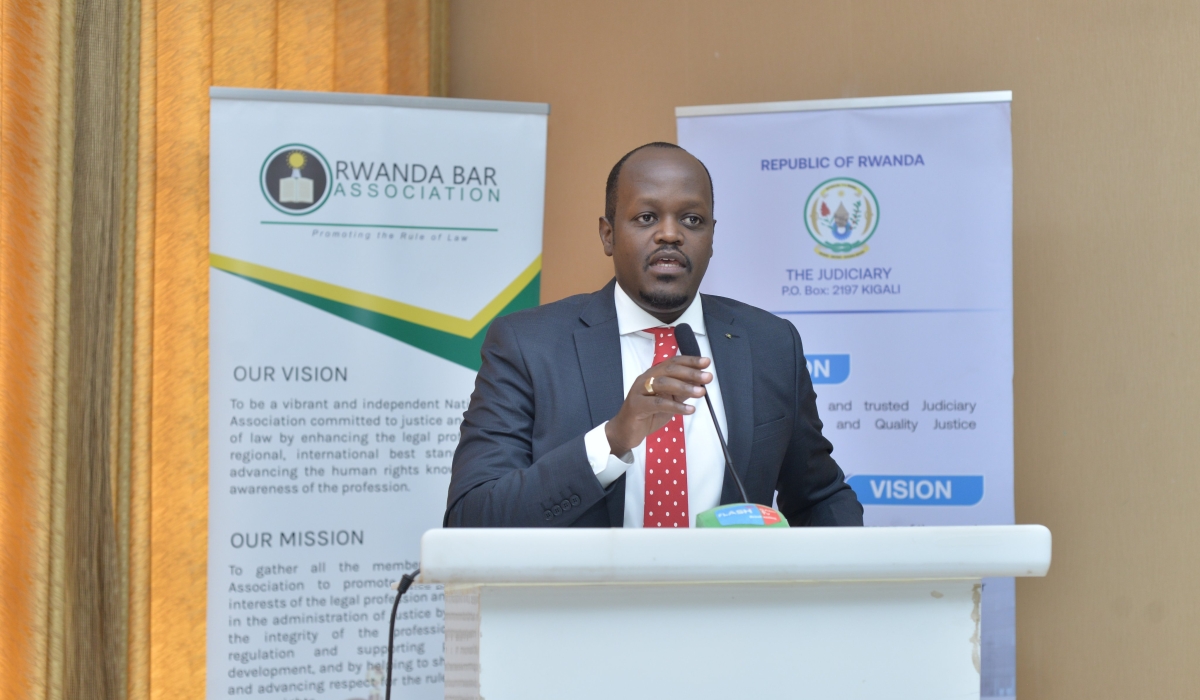 Moise Nkundabarashi, the President of the Rwanda Bar Association (RBA),addresses the meeting on August 31.
